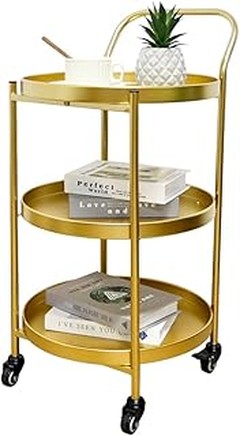 Inspírate con estas ideas de decoración usando un carro de bar dorado